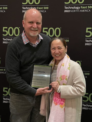 Tiffany Tran and Jason Klein accept 2022 Deloitte Fast 500 Award